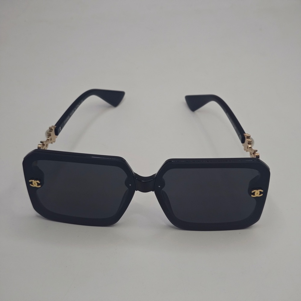 CHANEL Elegant Black Sunglasses with Gold Accents - Picture 2 of 6